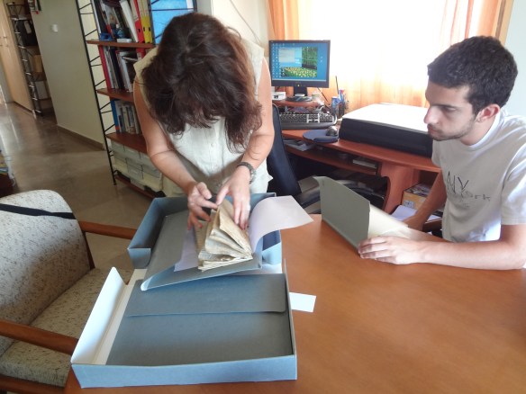 Maria Stellakou looks for a record.